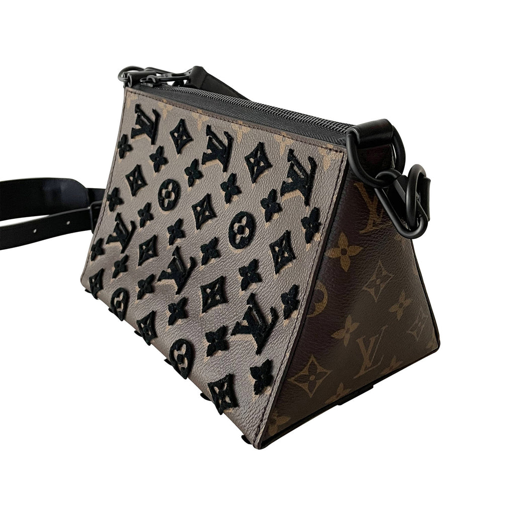 louis vuitton triangle messenger bag