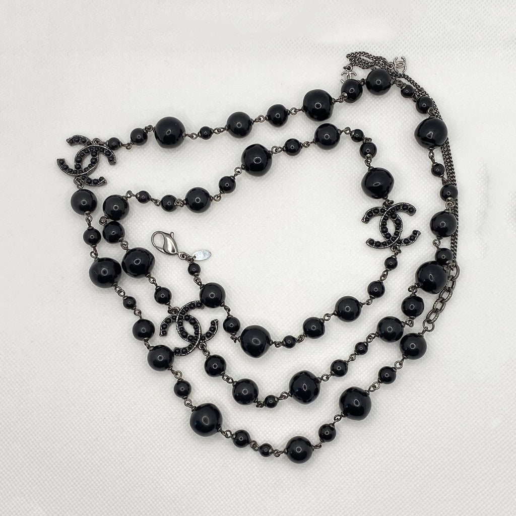 Shop authentic Chanel Black Bead Long Necklace at revogue for just