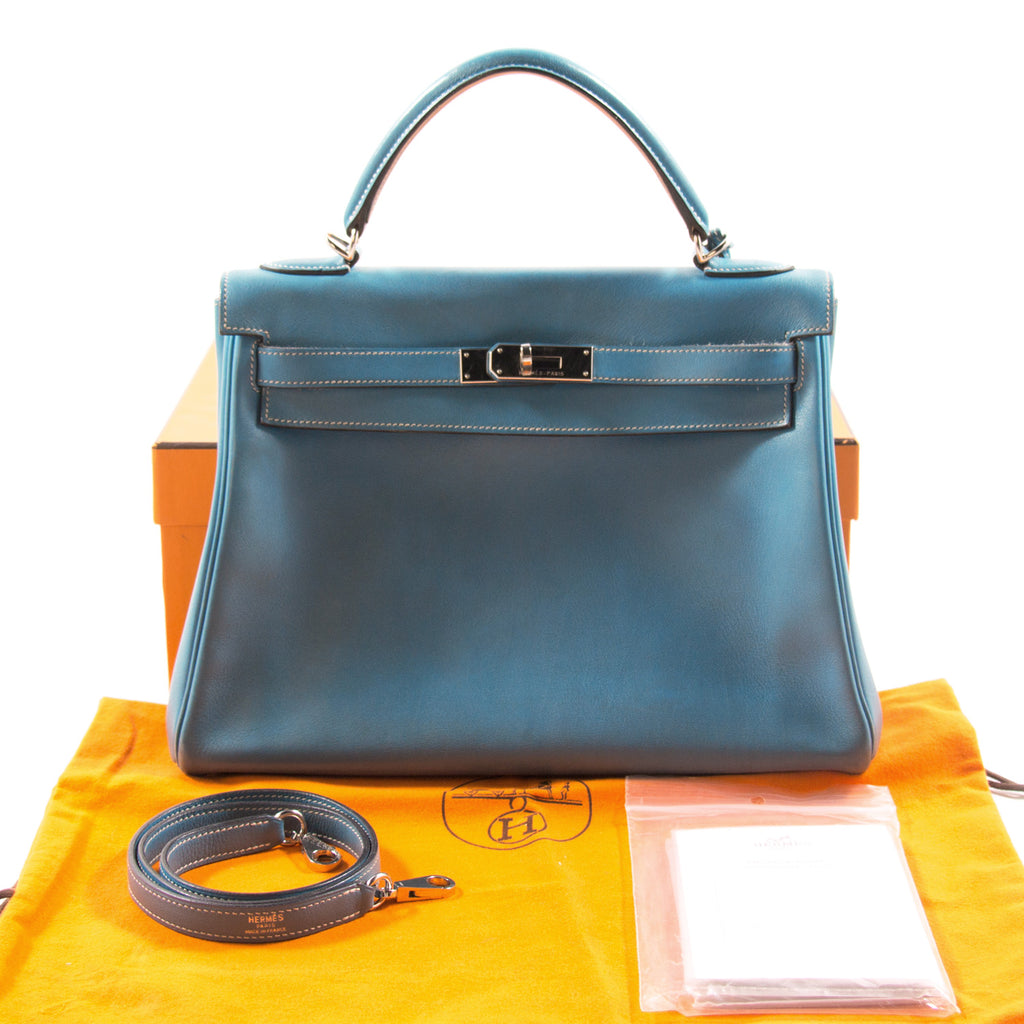 Hermès Kelly 32 Retourne Bleu Jean Swift Bags Hermès - Shop authentic new pre-owned designer brands online at Re-Vogue