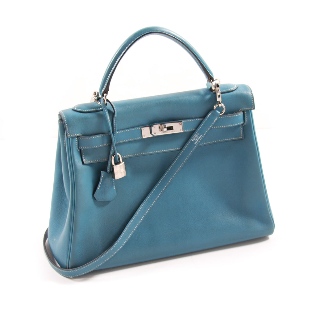 Hermès Bleu Jean Retourne Kelly 32cm of Togo Leather with Gold Hardware  Retourne Kelly 32cm GHW, Handbags & Accessories Online, Ecommerce Retail