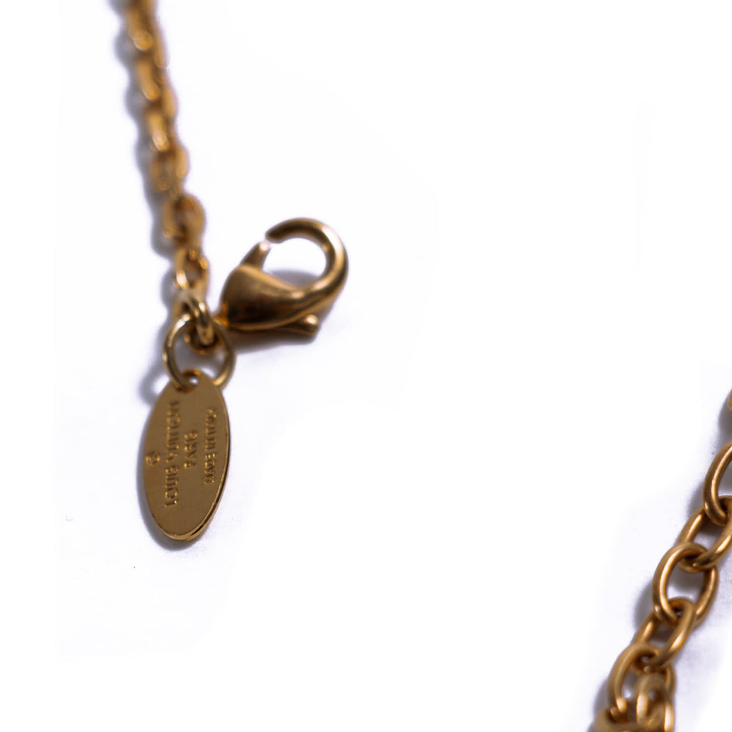 Louis Vuitton Crystal Gamble Necklace Accessories Louis Vuitton - Shop authentic new pre-owned designer brands online at Re-Vogue