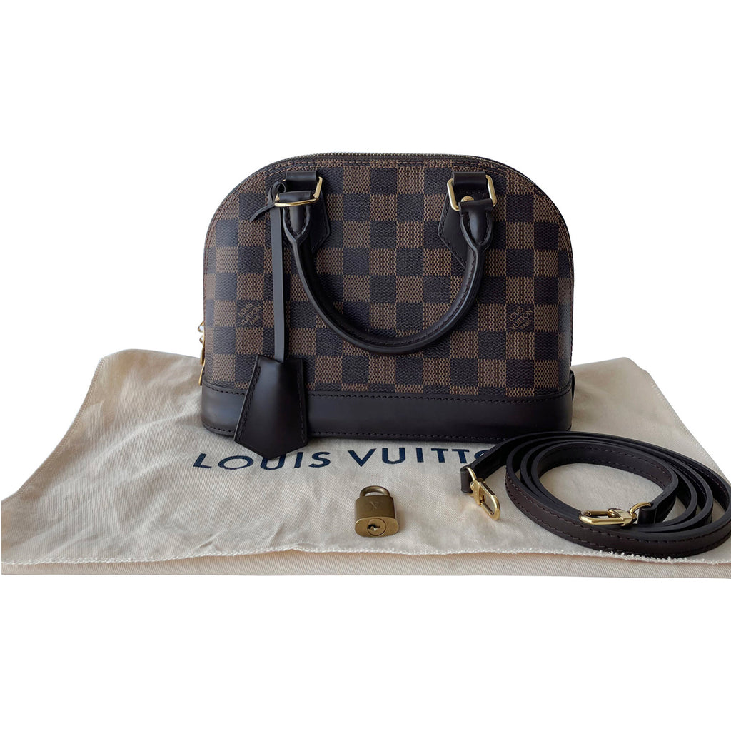 Louis Vuitton, Alma BB Damier plain, brown-checked rubbe…