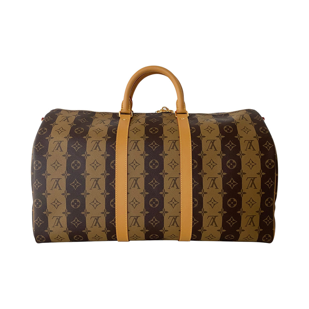 Louis Vuitton Keepall Bandouliere 50 with matted black and orange chain - LOUIS  VUITTON