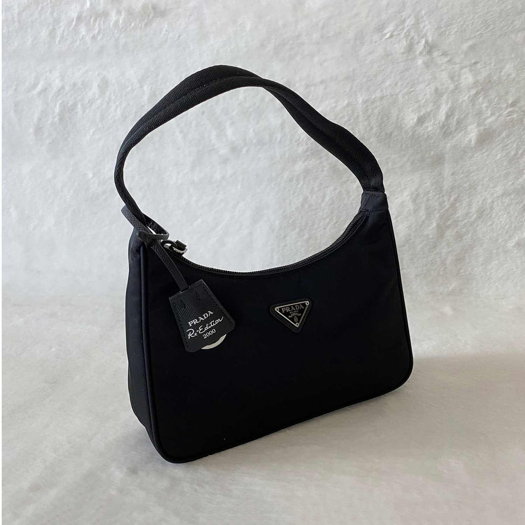 REPRICED‼️ 💎 Prada Re-Edition 2000 Black Nylon Mini Bag 💎, Luxury, Bags &  Wallets on Carousell