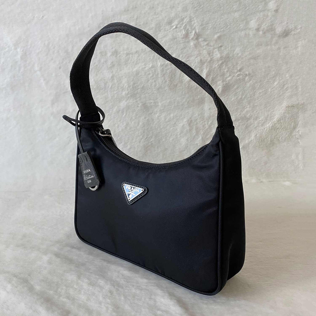 REPRICED‼️ 💎 Prada Re-Edition 2000 Black Nylon Mini Bag 💎, Luxury, Bags &  Wallets on Carousell